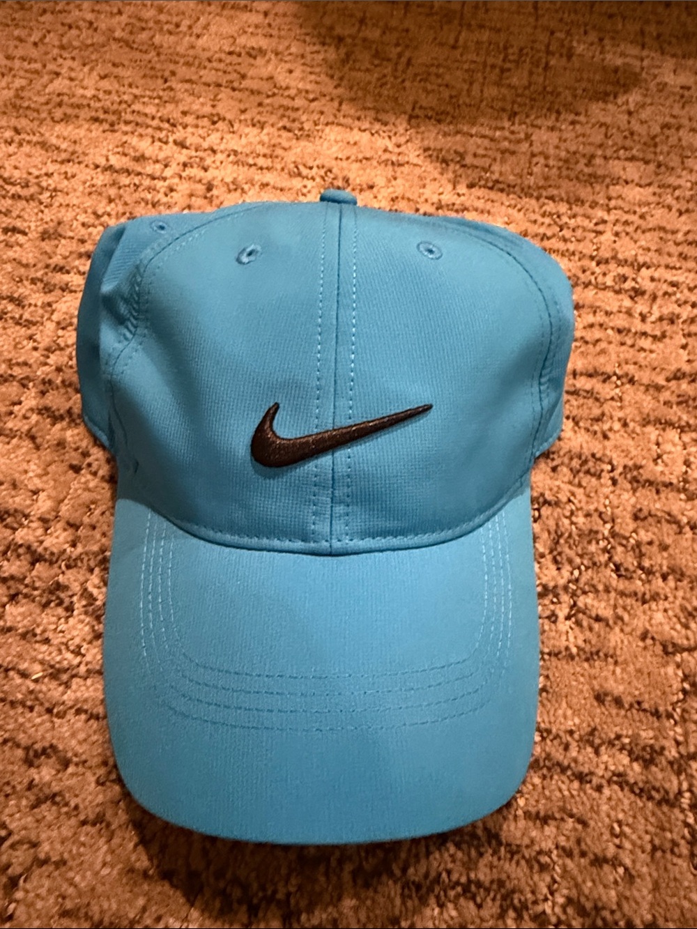 Brand new Nike Blue Baseball Cap with Black Swoosh